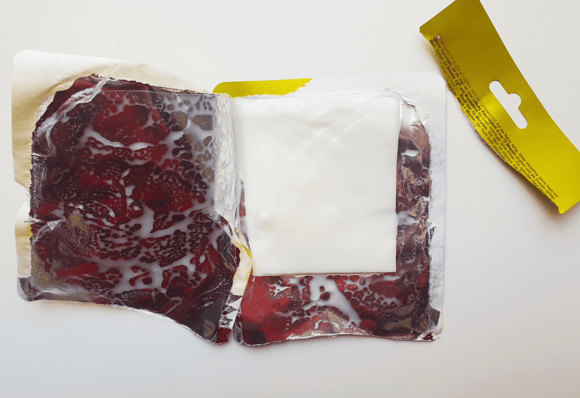 Opened Garnier SkinActive Vitamin C sheet mask showing the mask and inner packaging